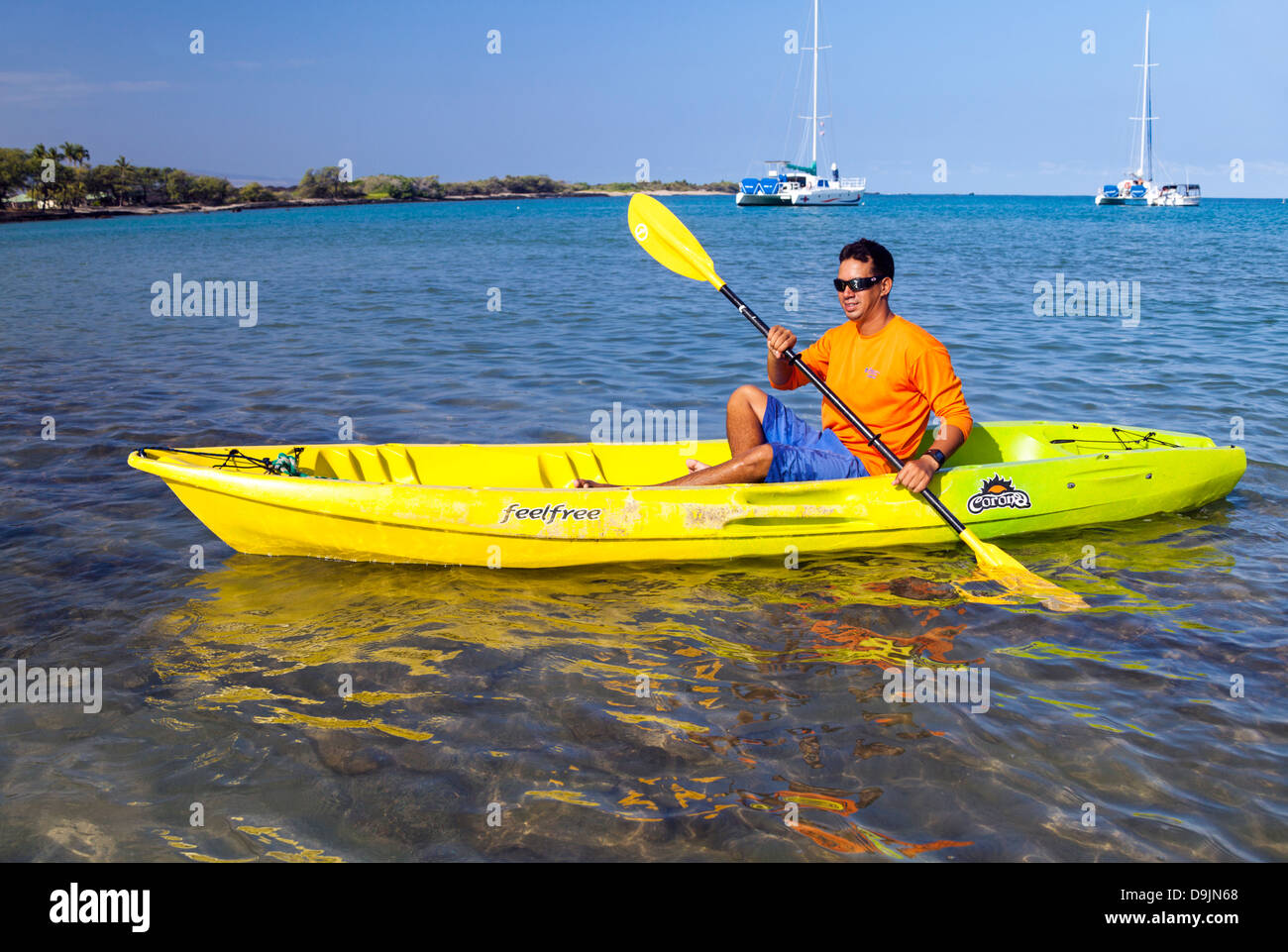 Kayaker in Anaehoomalu Bay in Waikoloa on the Big Island of Hawaii Stock Photo