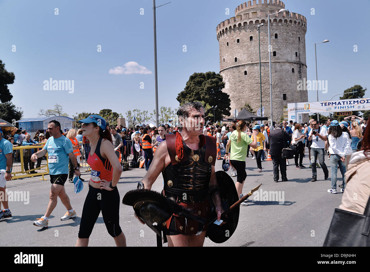 The man who run the Thessaloniki Marathon wearing an ancient armor.  Thessaloniki, Macedonia, Greece Stock Photo - Alamy