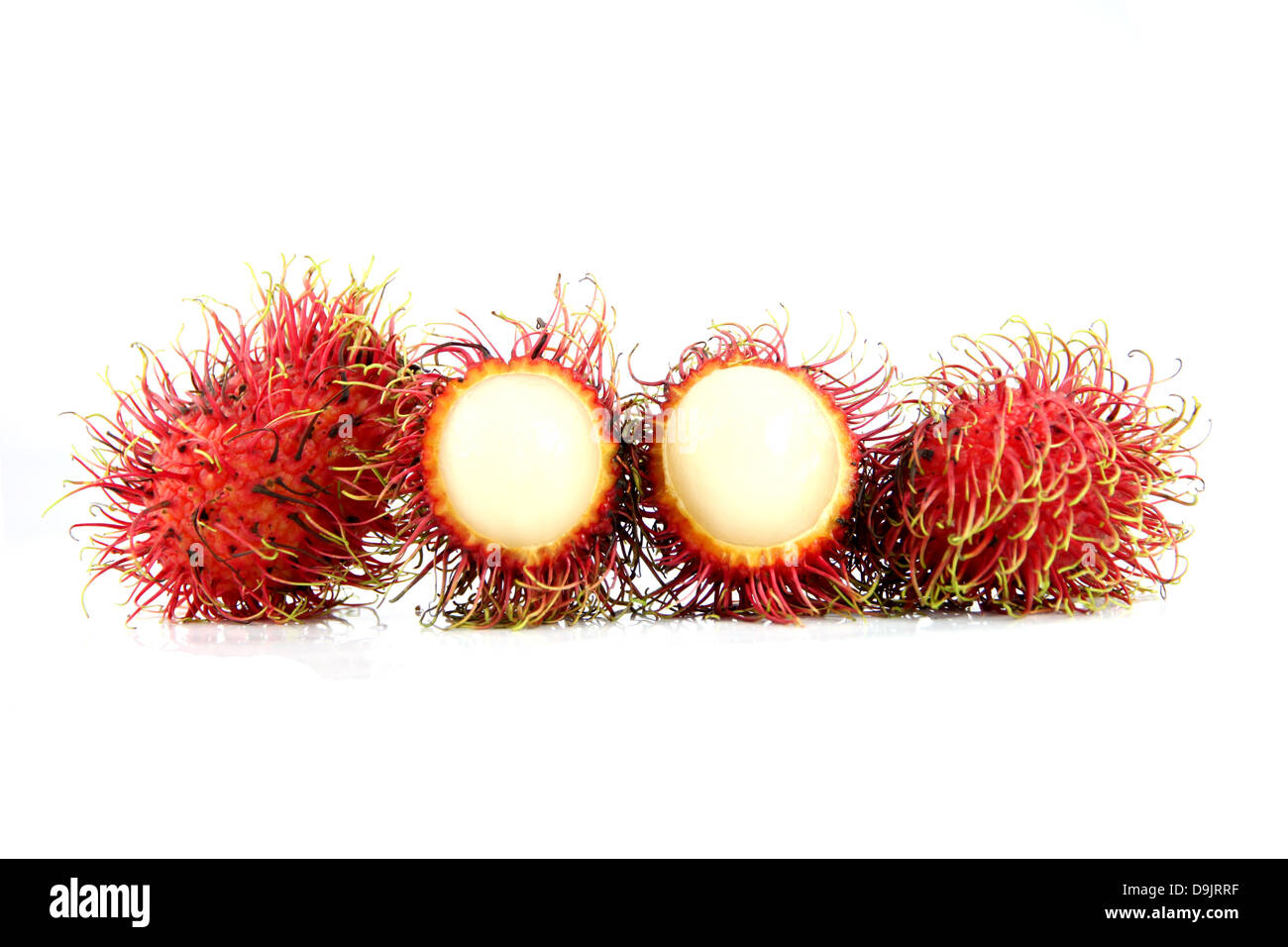 Rambutan Fruit is Peeled off on the white Background Stock Photo