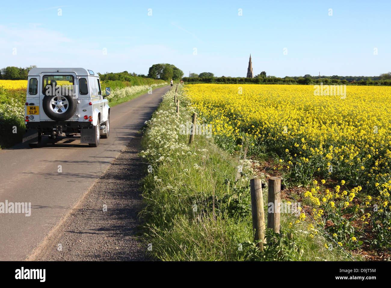 Land Rover on quiet country lane, near Greetham, Rutland Stock Photo