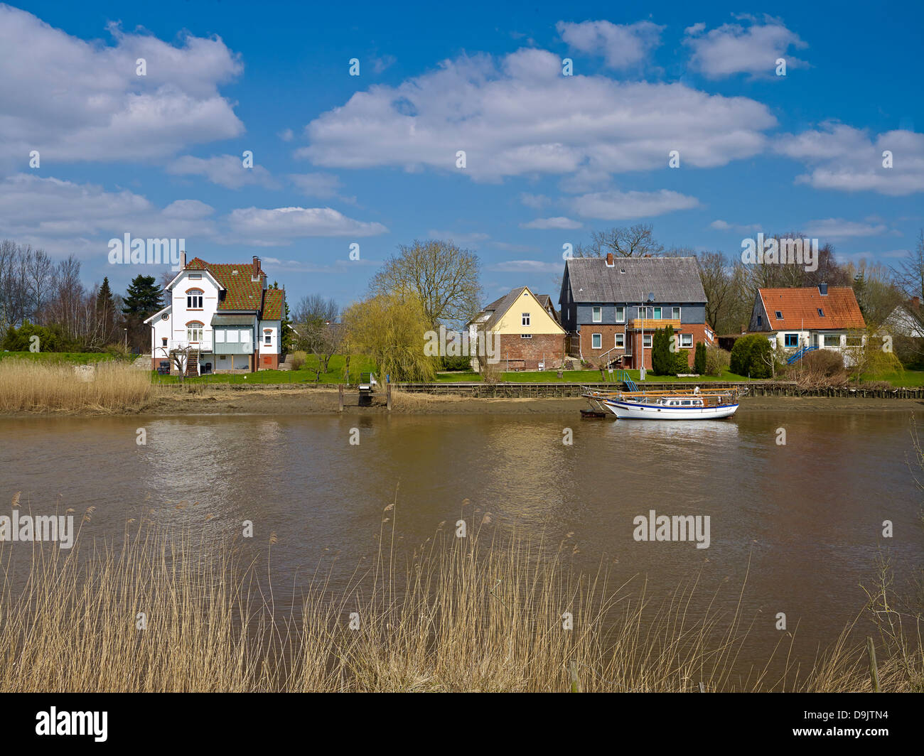 Houses of Osten at the Oste River, Hemmoor, Lower Saxony, Germany Stock Photo