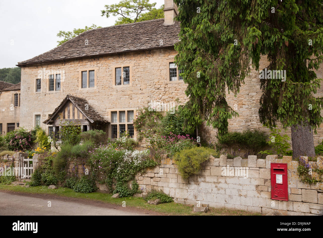 Stone cottages in the village of Iford, Wiltshire, England, UK Stock Photo