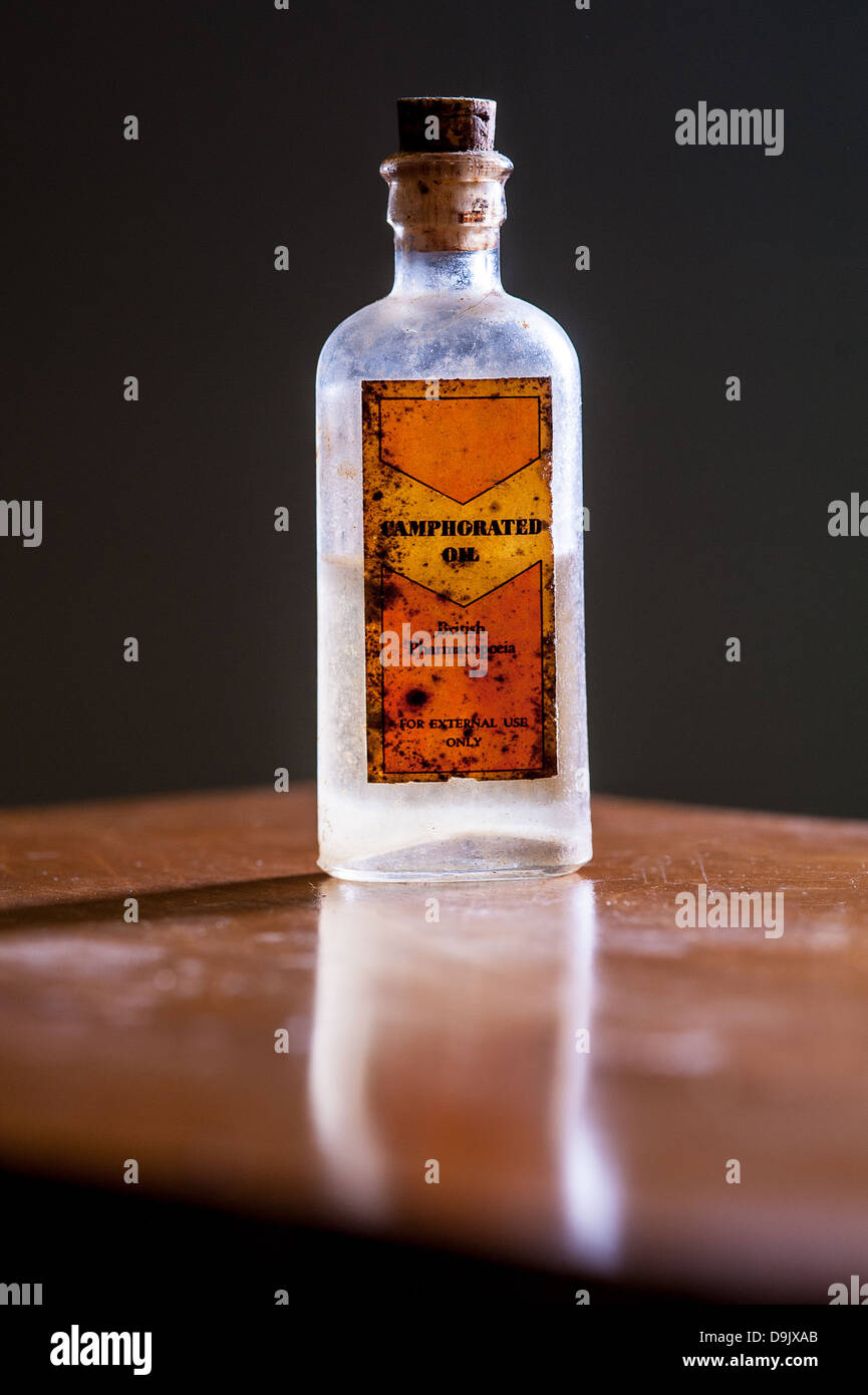 backlit vintage UK medicine bottle from fifties - medicine concept Stock Photo