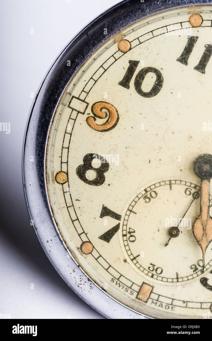 macro detail of shabby vintage pocket watch face - time concept Stock Photo
