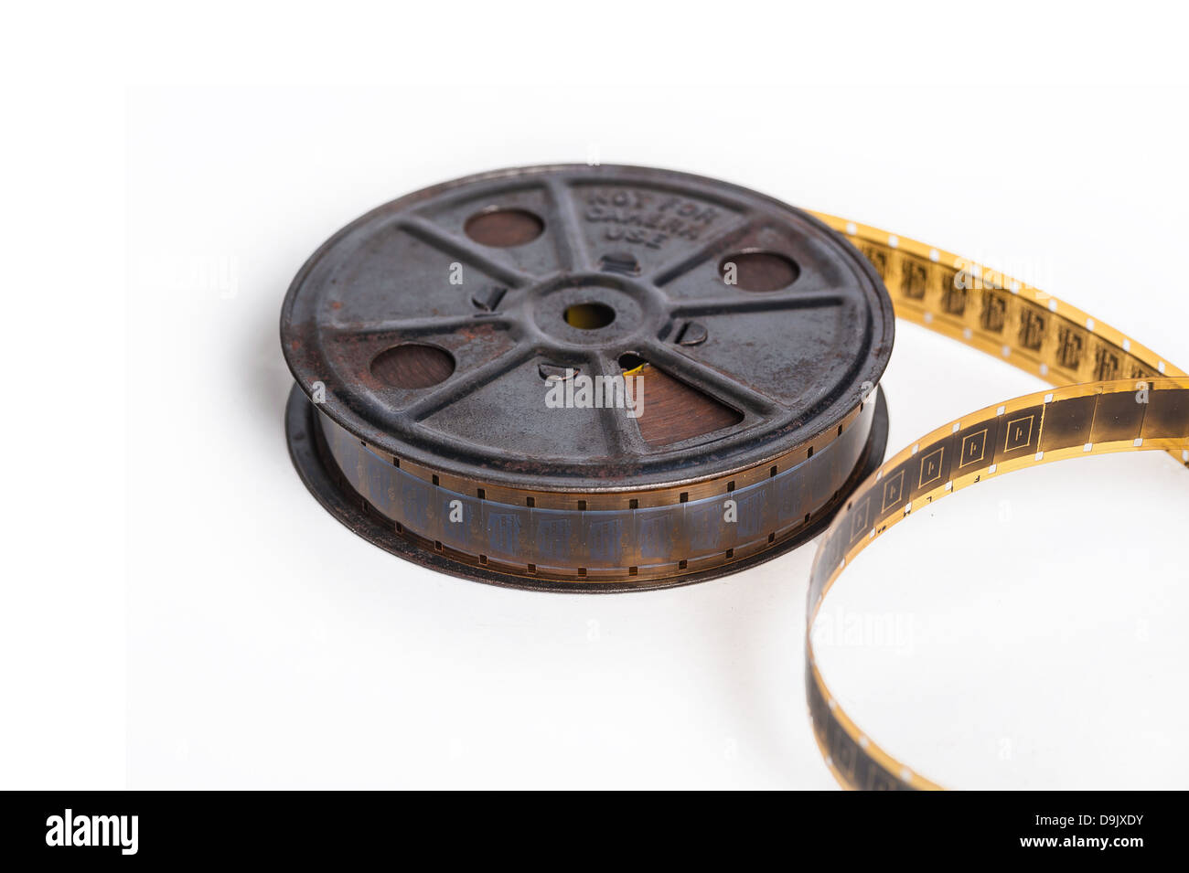 Vintage sepia 16mm film with reel - movie concept with space for