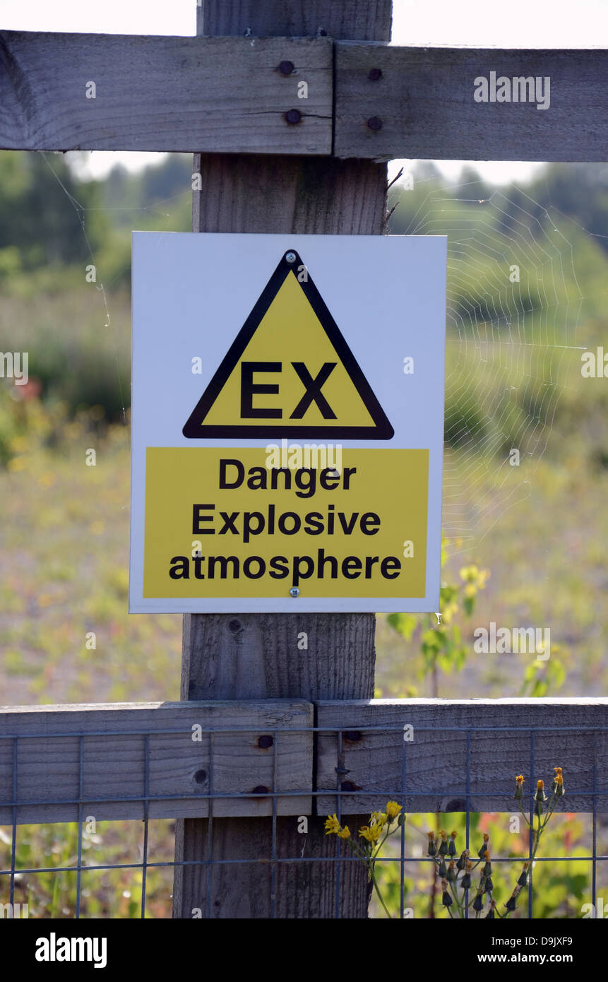 Warning Sign be aware danger explosive atmosphere health and safety signage Stock Photo