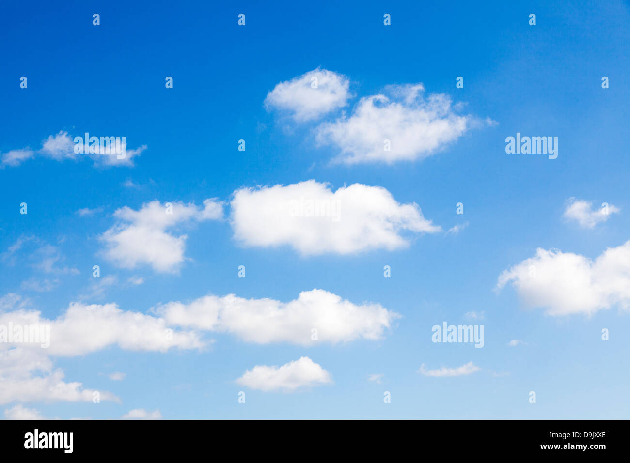 White fluffy cumulus clouds in a blue sky Stock Photo - Alamy