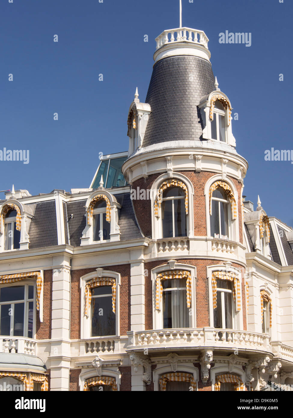 A house with a tower in Amsterdam, Netherlands. Stock Photo