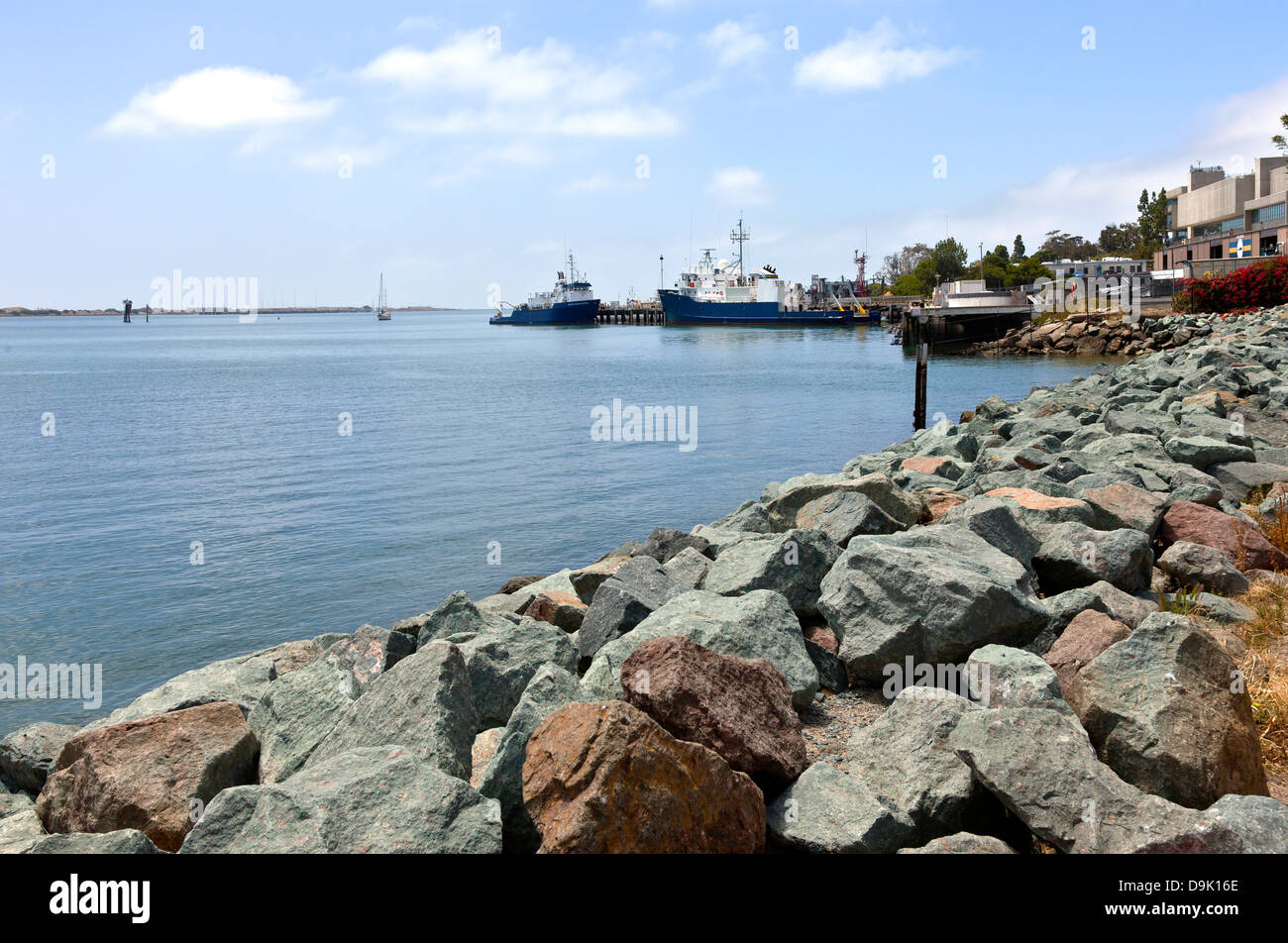 Point Loma beaches neighborhood Fishing vessels and rocks California. Stock Photo