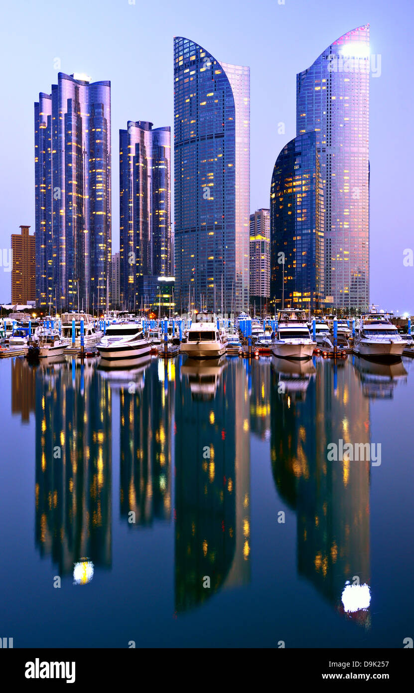 Skyline of luxury residential high rises in the Haeundae district of Busan, South Korea at dusk. Stock Photo