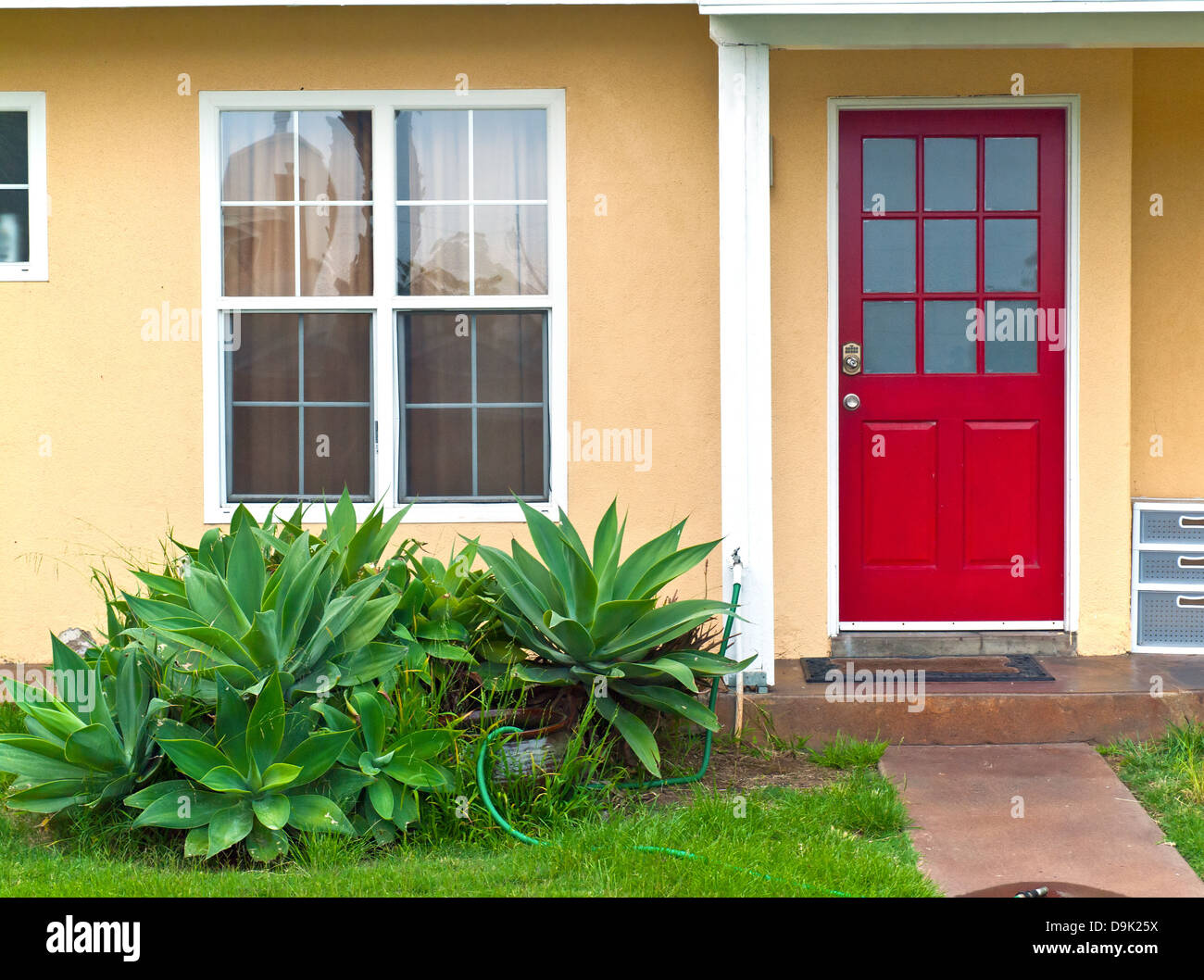 A red door entrance Point Loma San Diego California. Stock Photo
