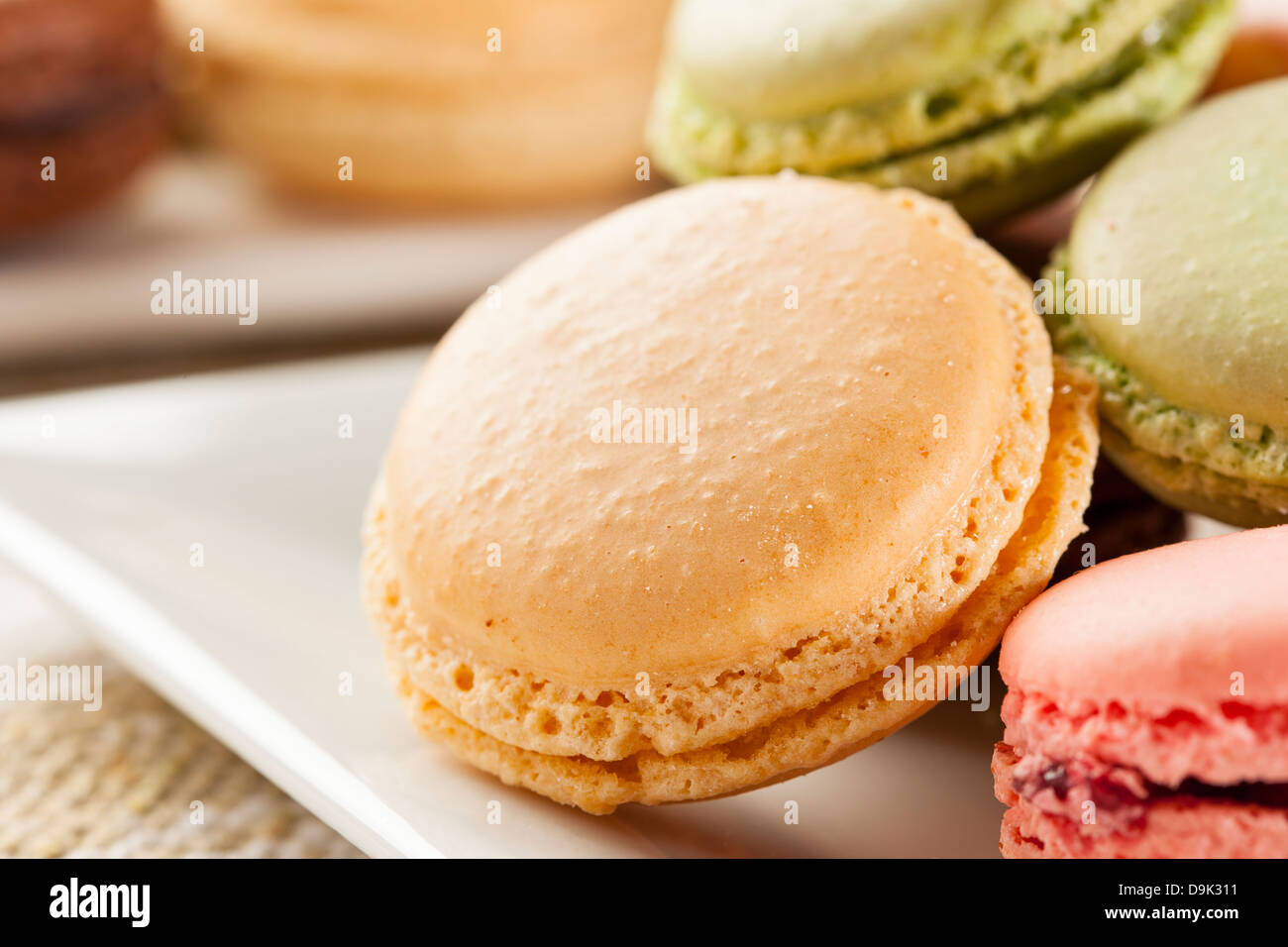 Gourmet Colored Macaroon Cookies with a cream filling Stock Photo