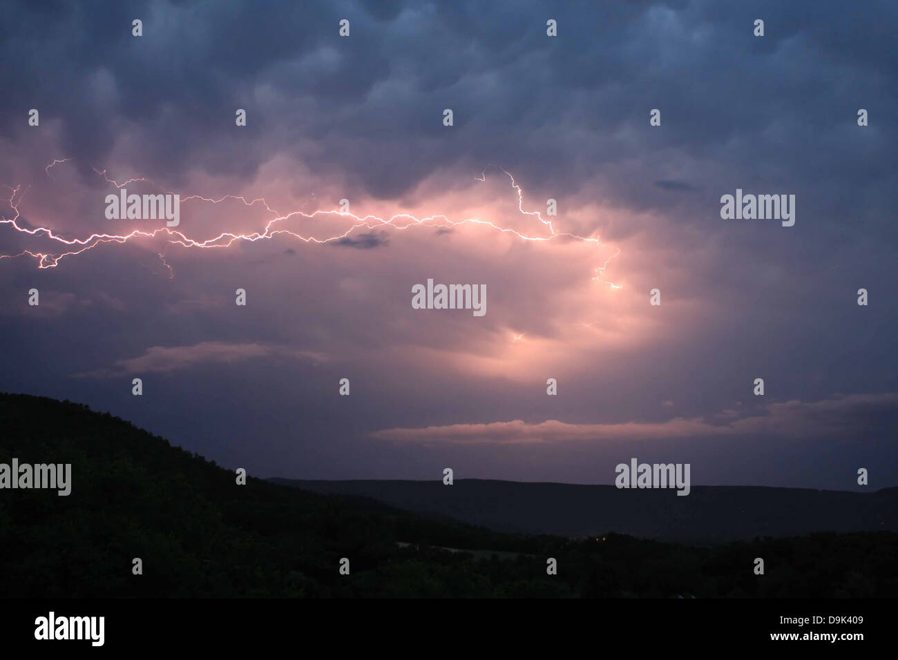 storm clouds lightning weather mountain rain danger dangerous Stock