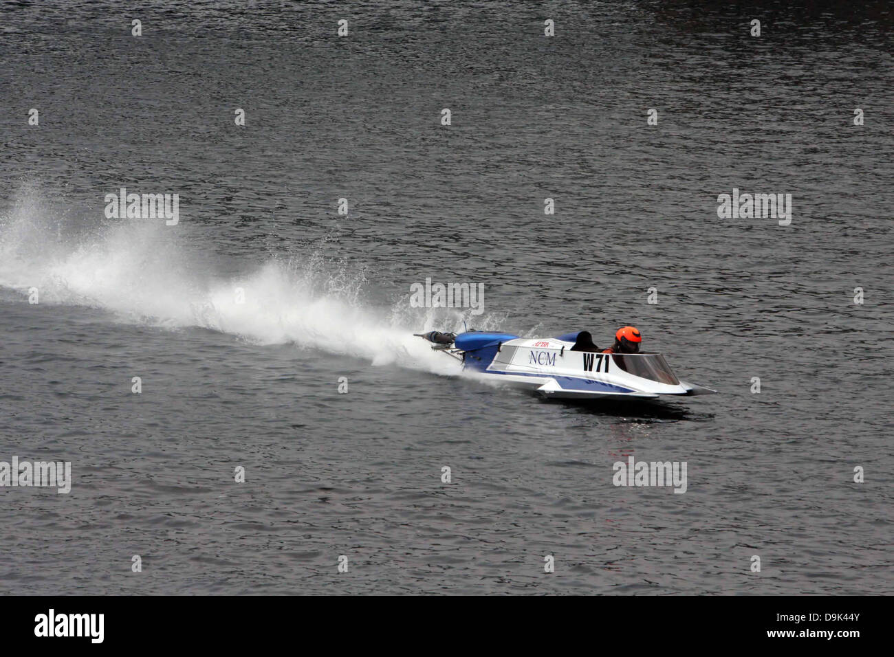 River Races Box outboard boat races on water river Stock Photo - Alamy