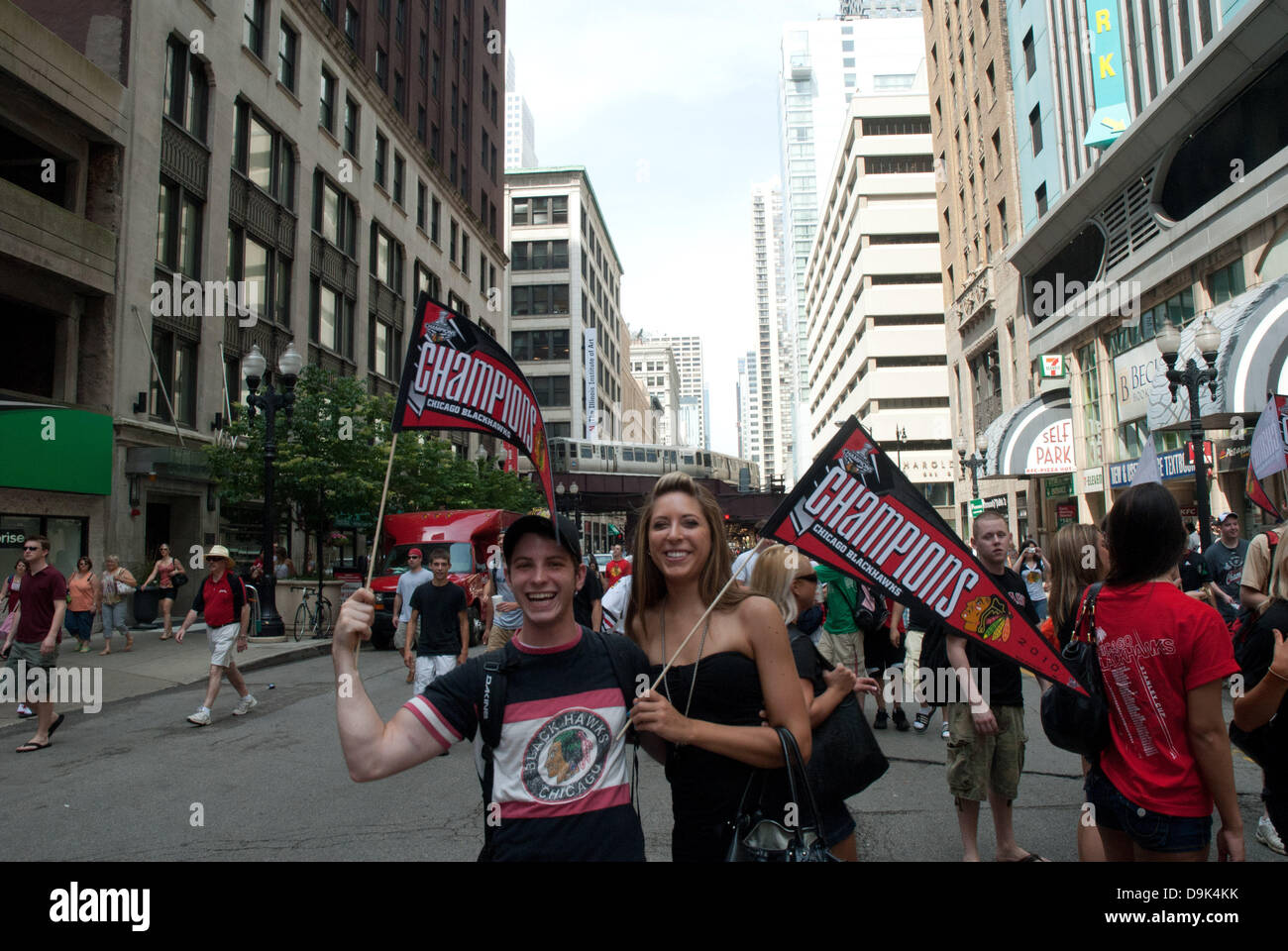 Jun 11, 2010 - Chicago, Illinois, U.S. - Fan carries fake Stanley cup on  Wacker Drive. Parade on Michigan Avenue to celebrate the Stanley Cup 2010  championship win of the Chicago Blackhawks