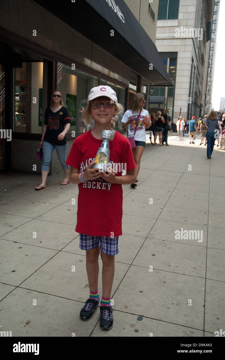 Jun 11, 2010 - Chicago, Illinois, U.S. - Fan carries fake Stanley cup on  Wacker Drive. Parade on Michigan Avenue to celebrate the Stanley Cup 2010  championship win of the Chicago Blackhawks