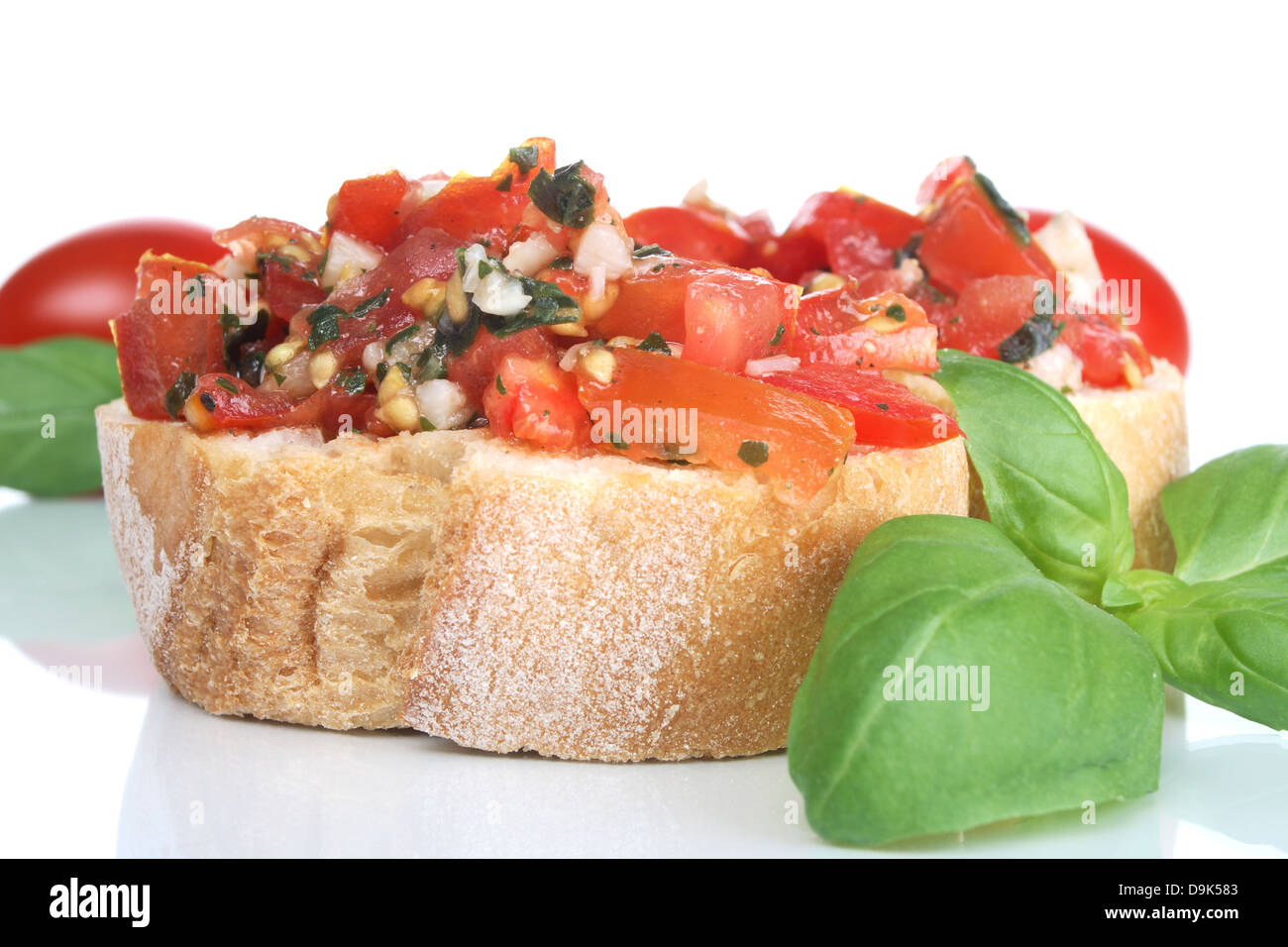 Bruschetta with basil Stock Photo - Alamy