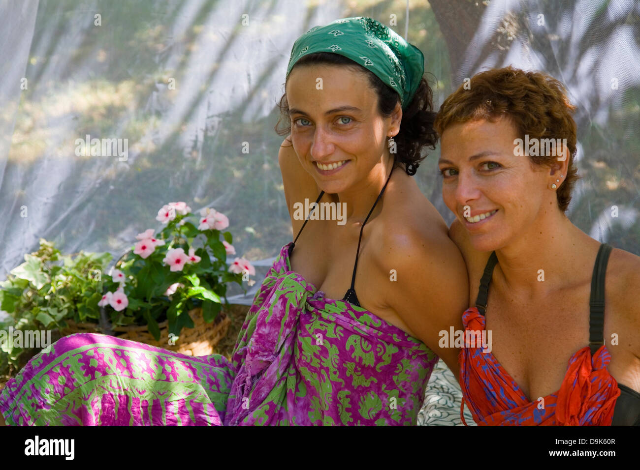 two young women in a garden Stock Photo - Alamy