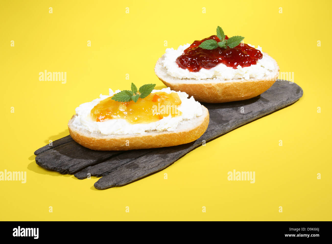 Bread rolls with cream cheese Stock Photo Alamy