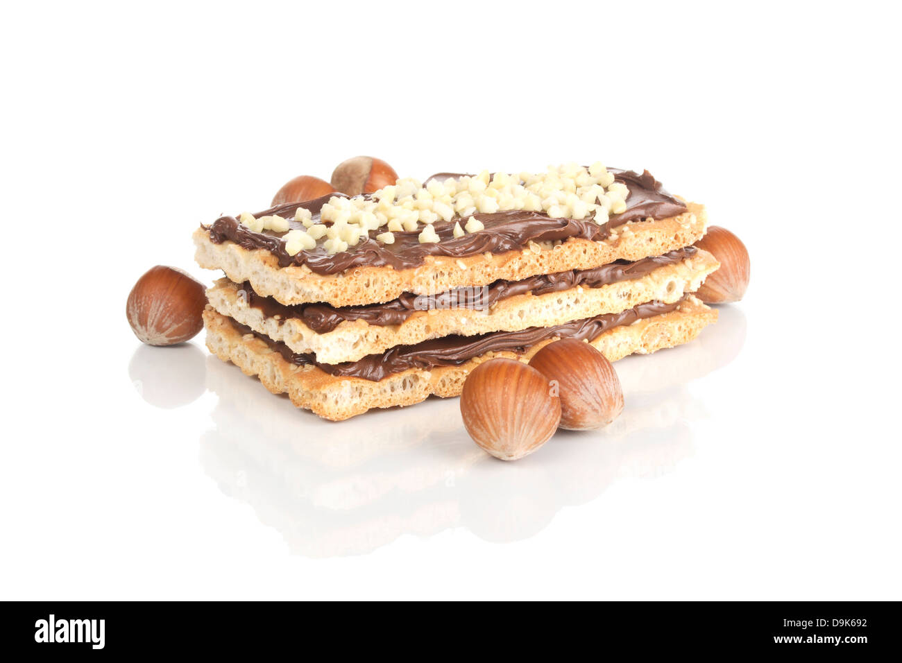 Nut nougat cuts with hazelnuts Stock Photo