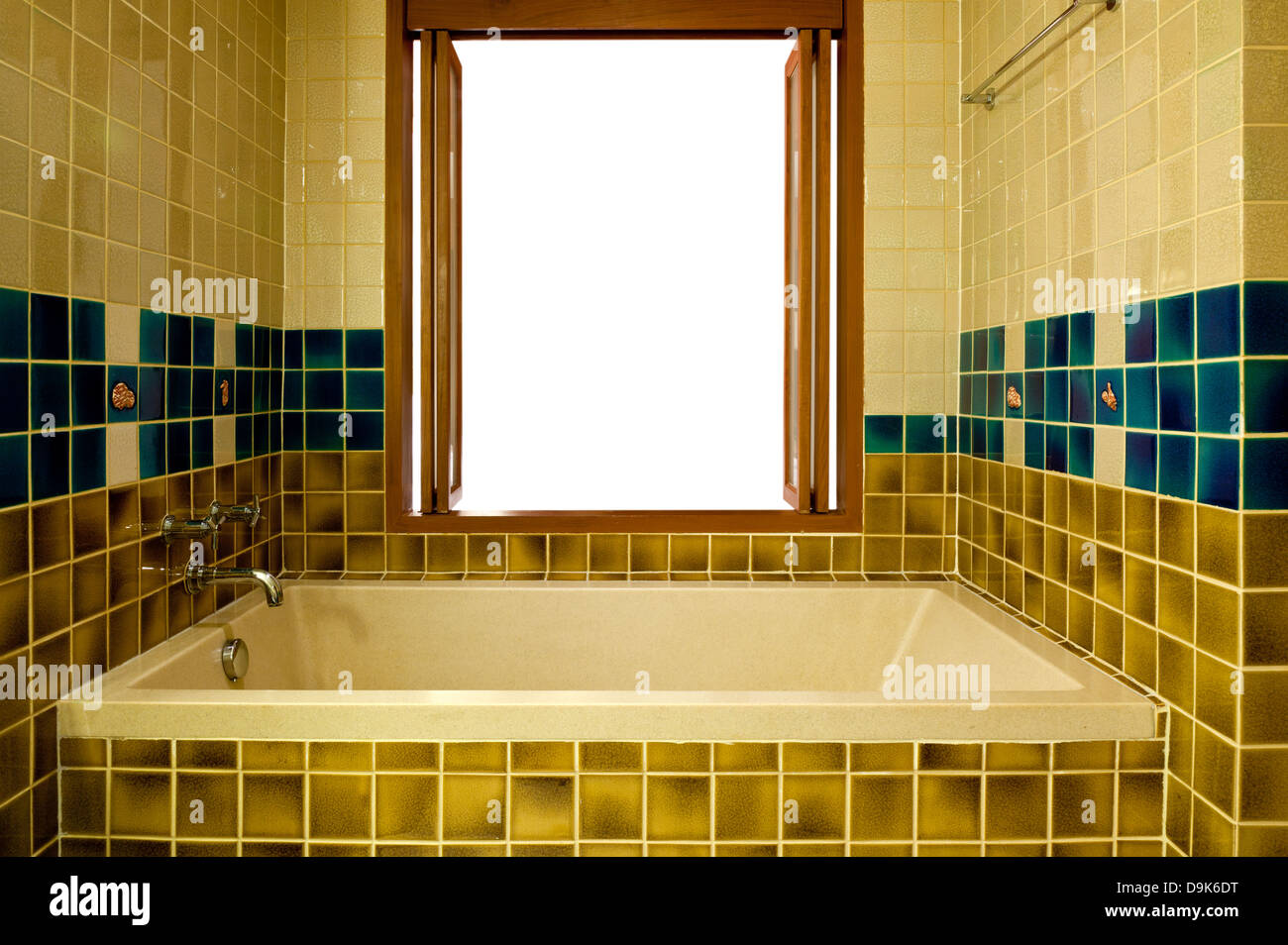 Interior of a bathroom with a bathtub and open window Stock Photo
