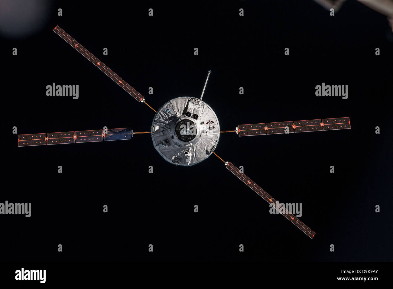 European Space Agency supply and support ferry the Automated Transfer Vehicle called Albert Einstein approaches the International Space Station to dock June 15, 2013 in earth orbit. ATV Albert Einstein brought 7 tones of supplies, propellants and experiments to the complex. Stock Photo