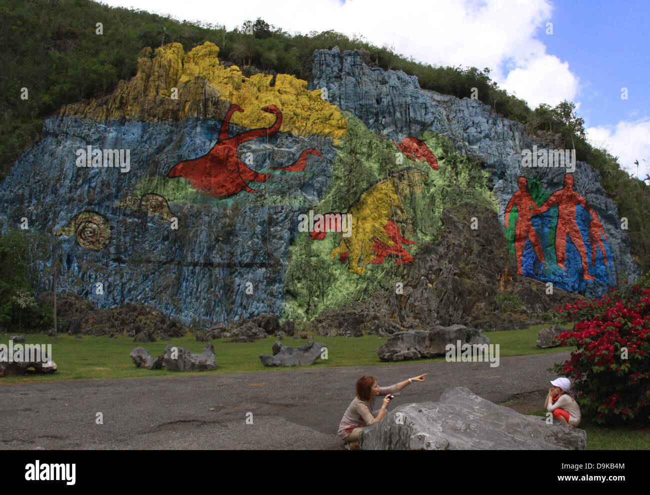The 'Mural de la Prehistoria', crafted by Mexican artist Leovigildo González Morillov in 1961, is on display on a chalk cliff in the Valle de las dos Hermanas valley of Vinales, in the province of Pinar del Rio, Cuba, 11 April 2013. Photo: Peter Zimmermann Stock Photo