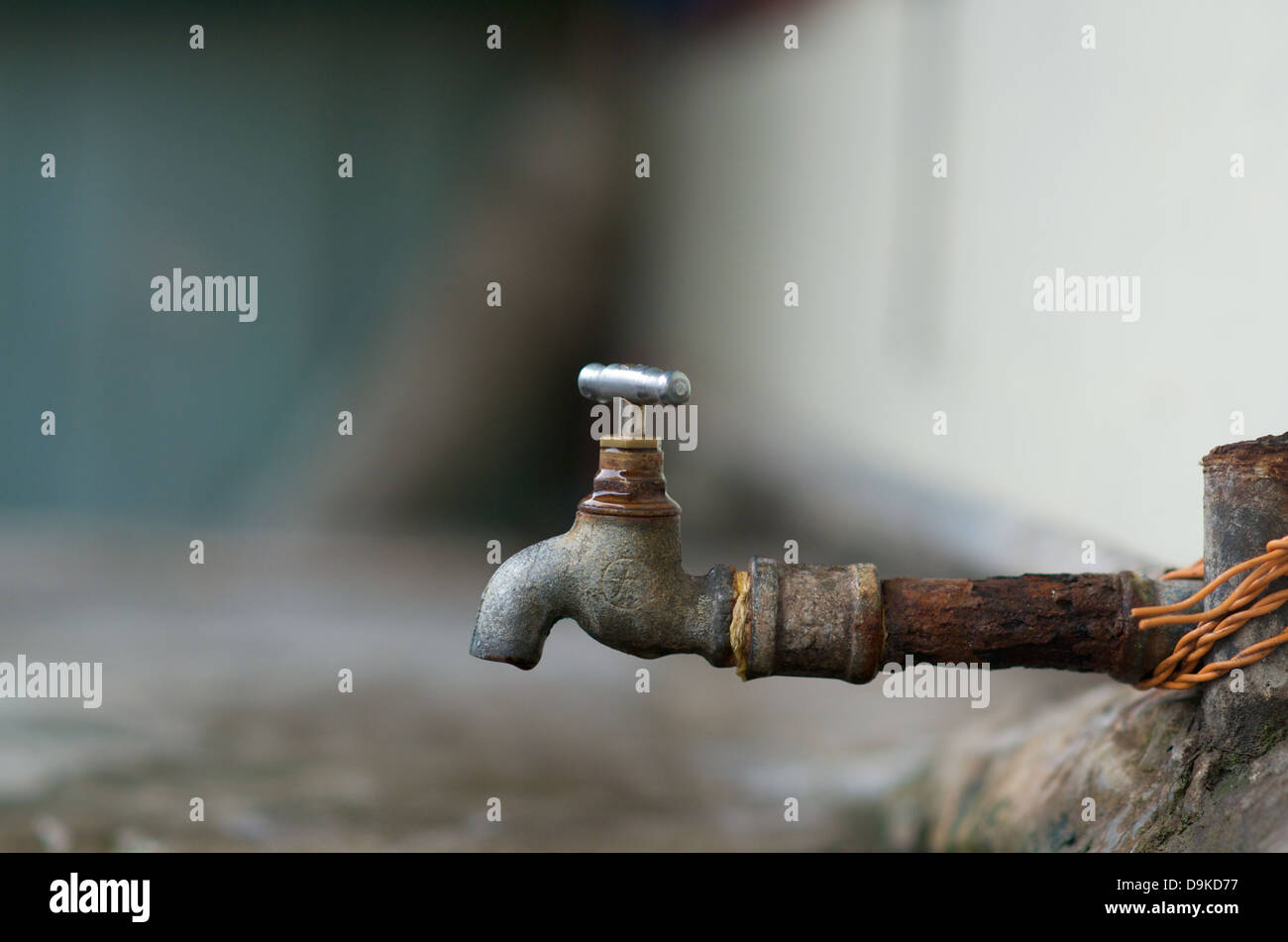 Dripping water faucet outdoor Stock Photo