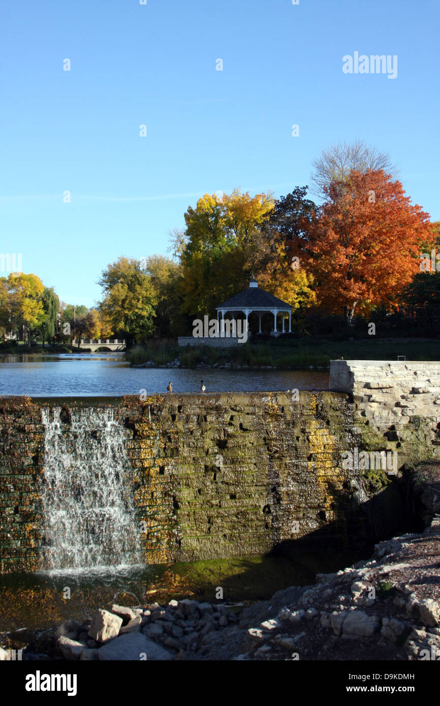 Water flowing over the Mill Pond dam in Menomonee Falls Wisconsin
