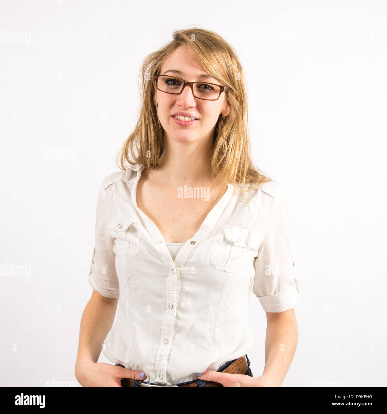 A happy smiling positive young woman with long blonde hair wearing ...