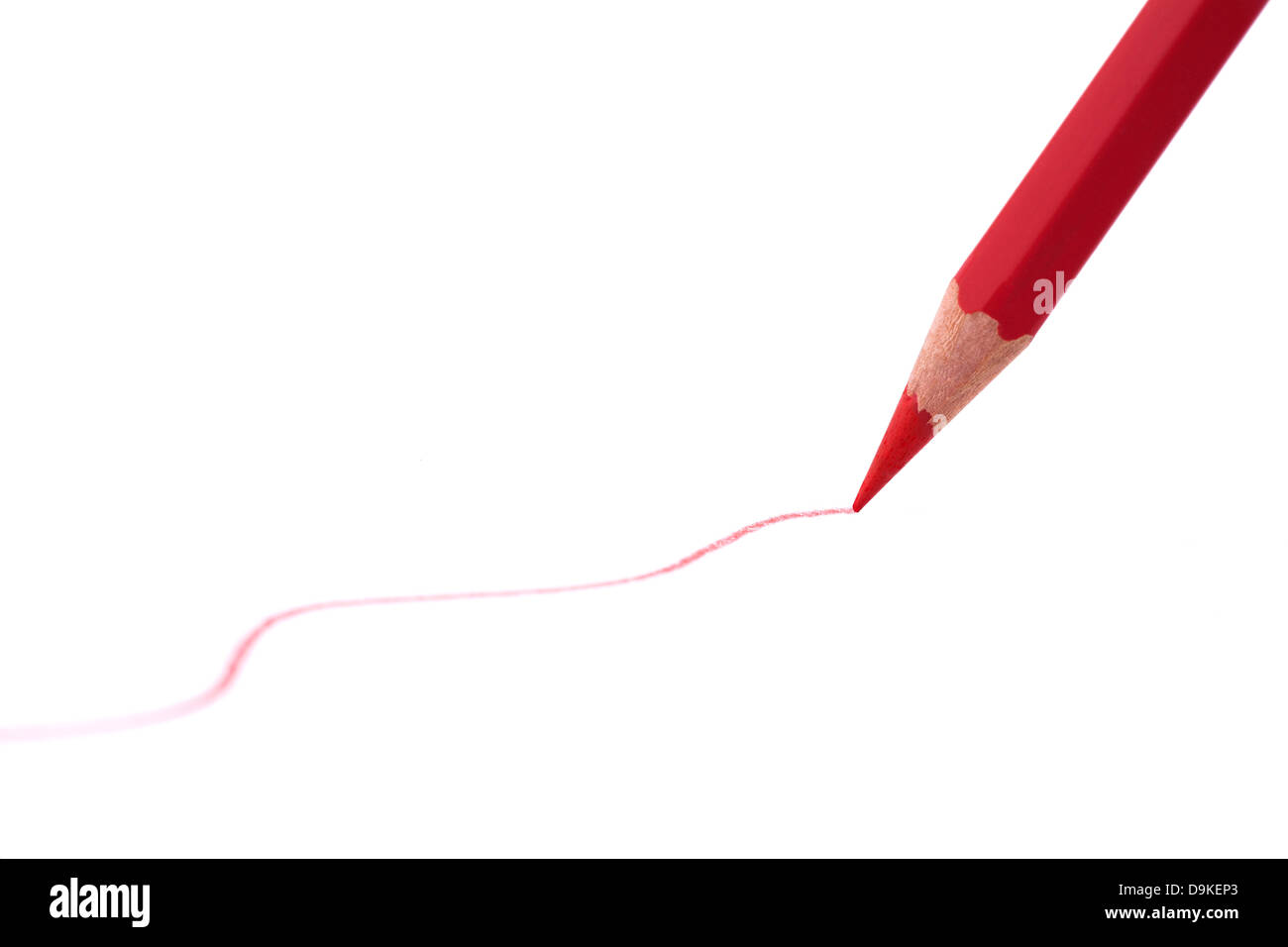 Drawing line with red pencil Stock Photo