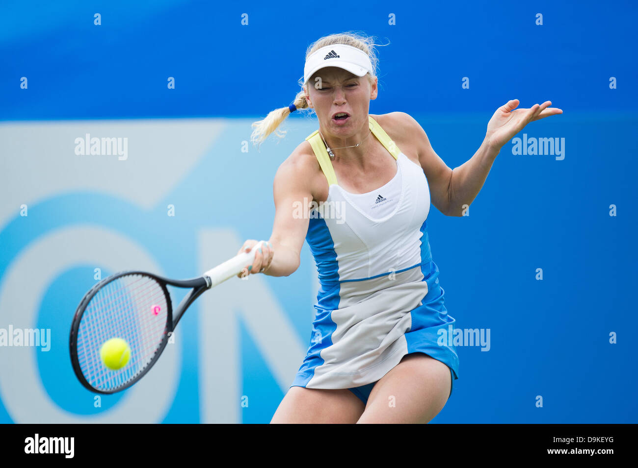 Eastbourne, UK - Friday 21st June: Caroline Wozniacki of Denmark in action hitting a single handed forehand in her match against Jamie Hampton of the USA on centre court in the semi-finals of the Aegon International. Jamie Hampton won the match 6-7, 7-5, 6-3. Credit:  Mike French/Alamy Live News Stock Photo