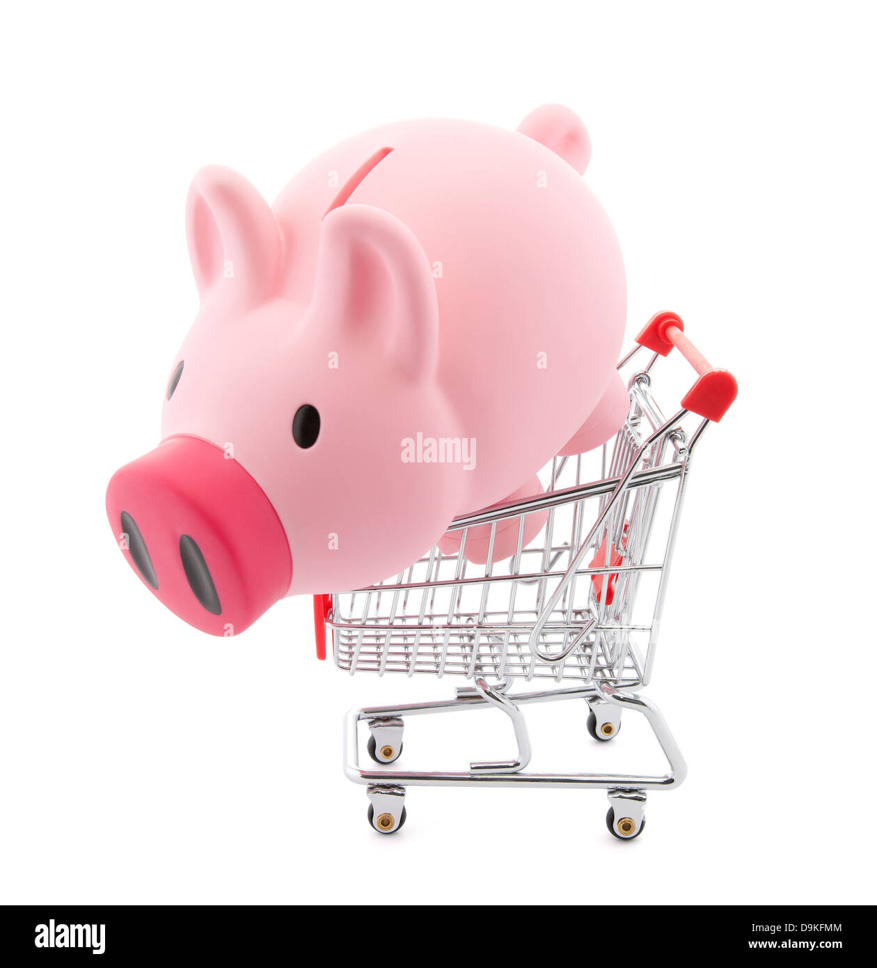 Piggy bank with shopping cart. Clipping path included Stock Photo