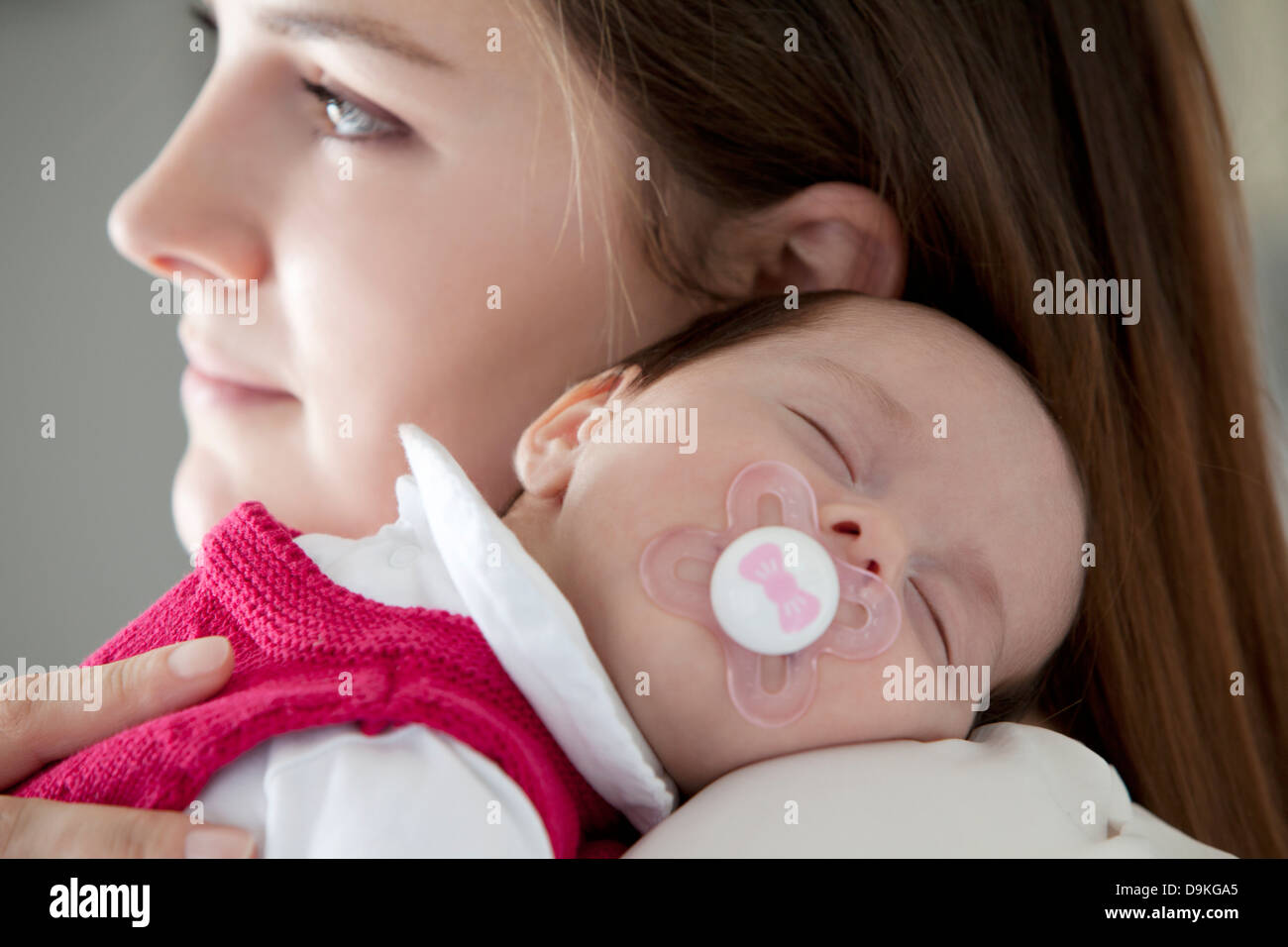 woman with newborn baby girl Stock Photo