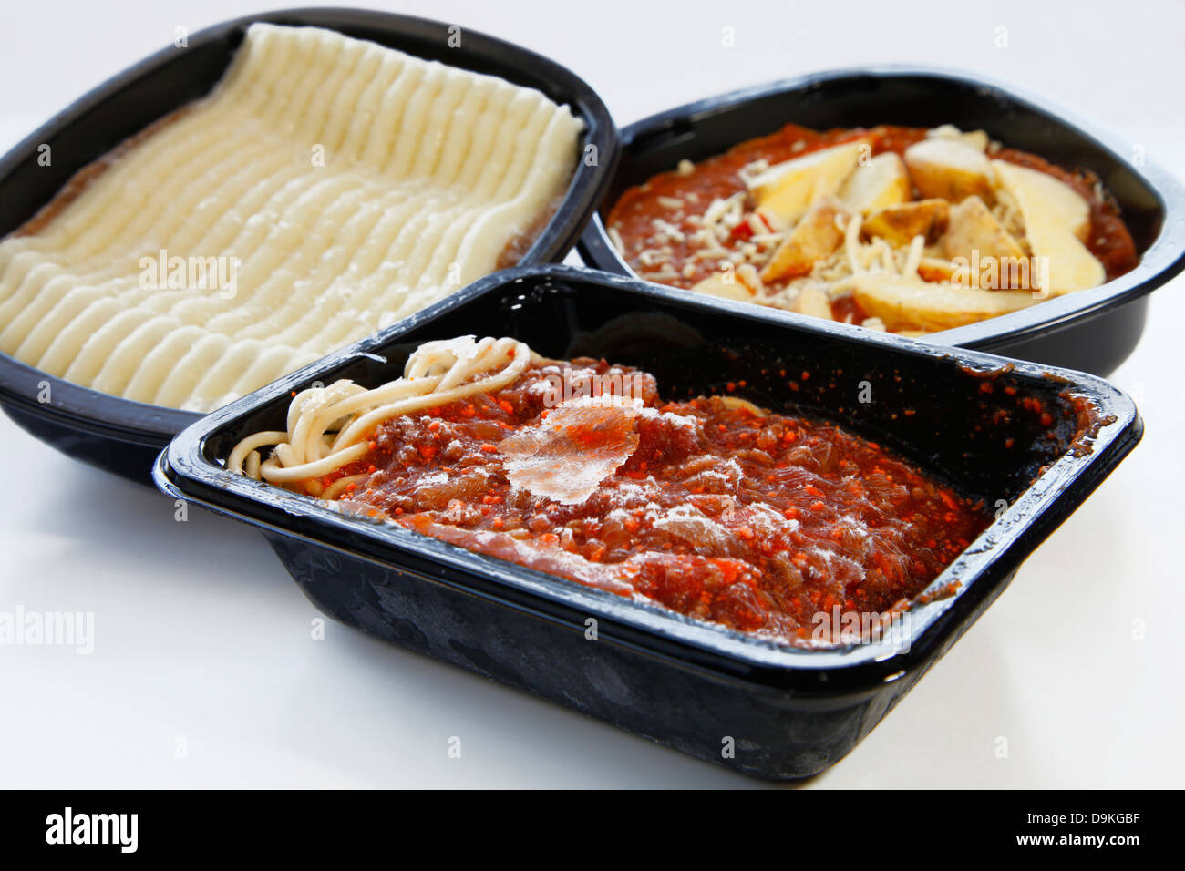 3 common TV dinners Chili chips Sheperds Pie and Spaghetti Bolognese Stock Photo