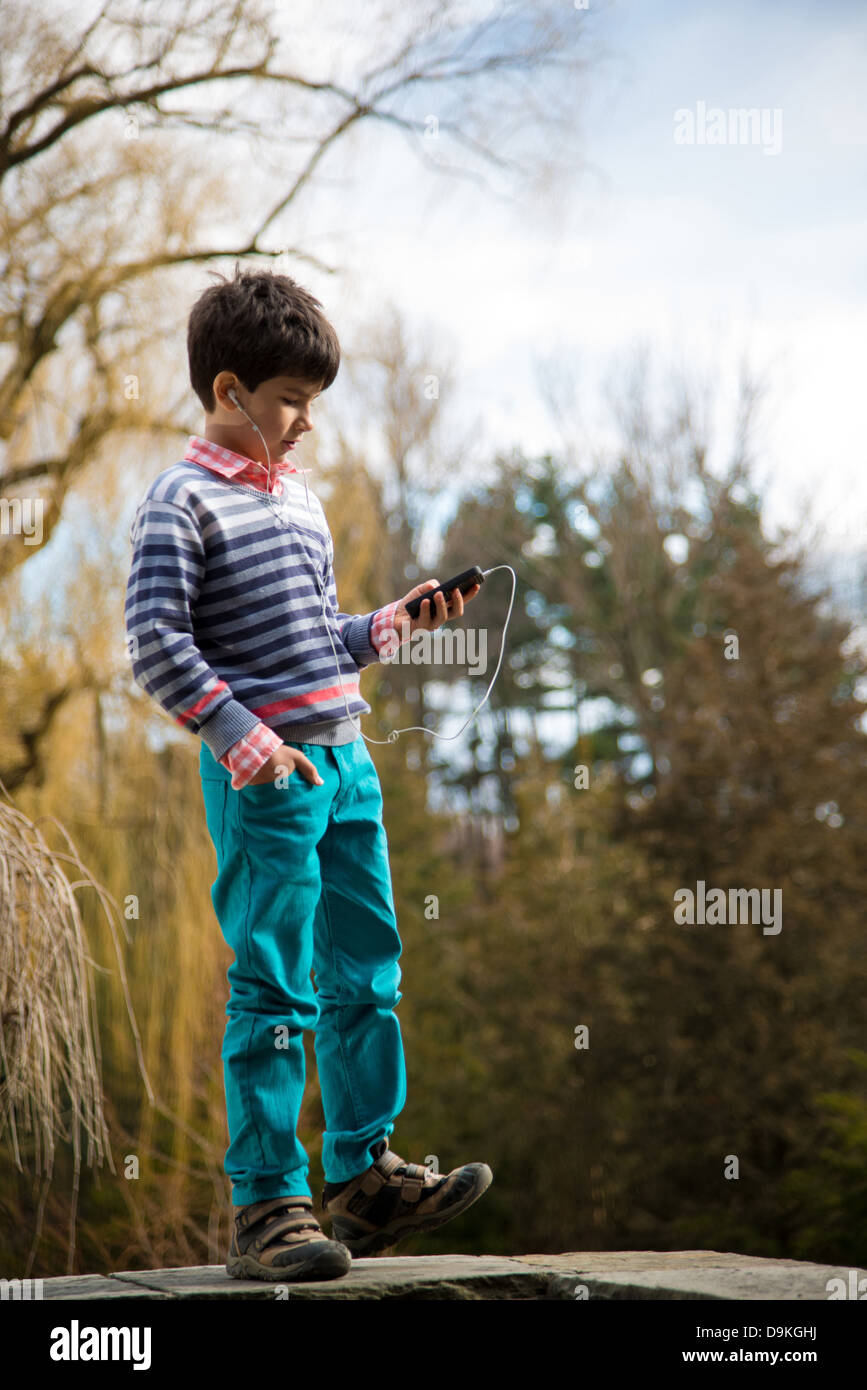 Boy playing on playground hi-res stock photography and images - Alamy