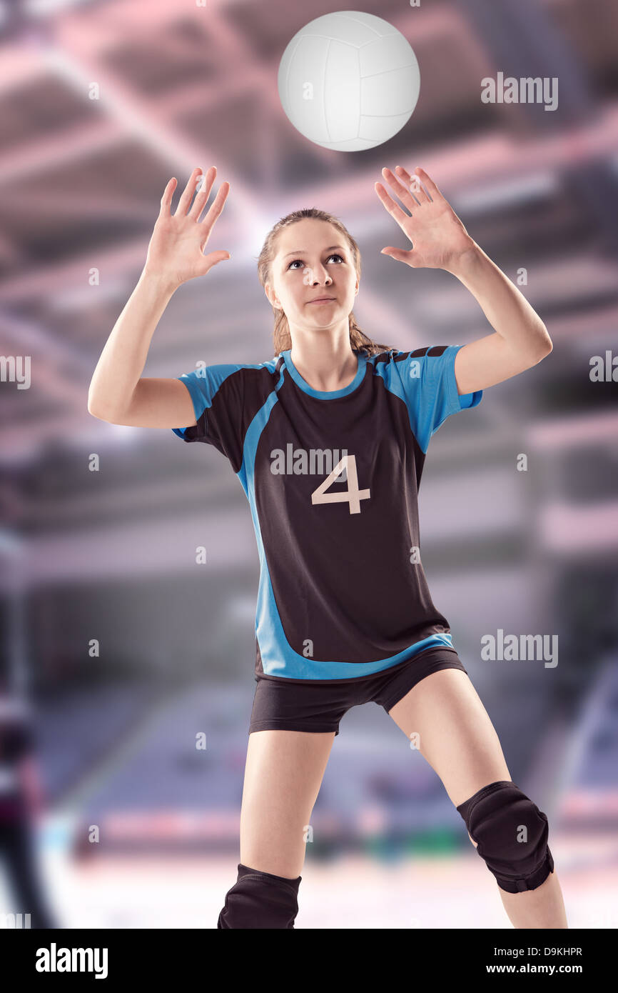 female volleyball player with a ball Stock Photo