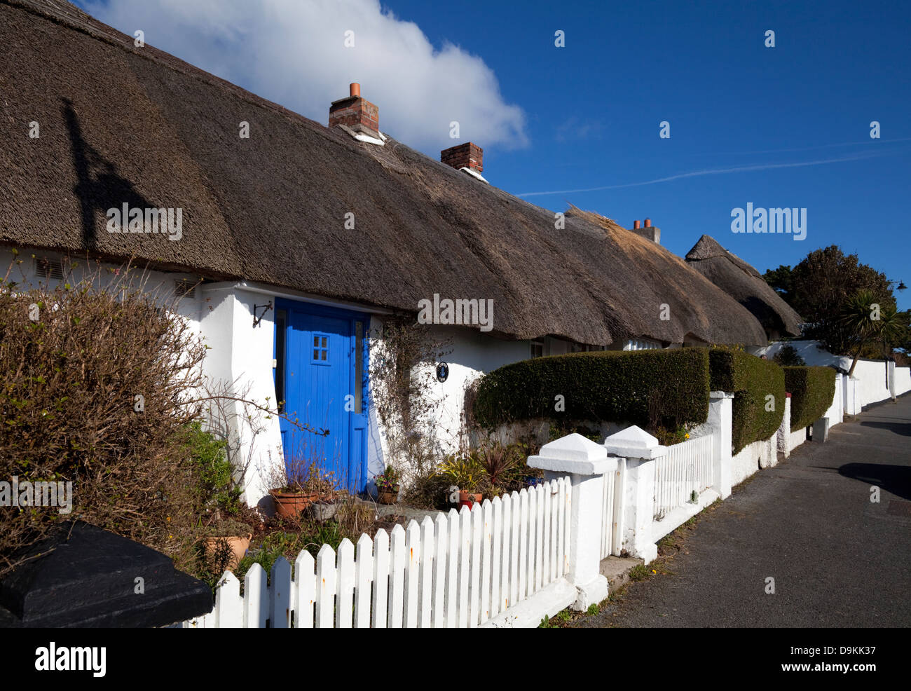Thatched Terraced cottages in the main street, Dunmore East Fishing