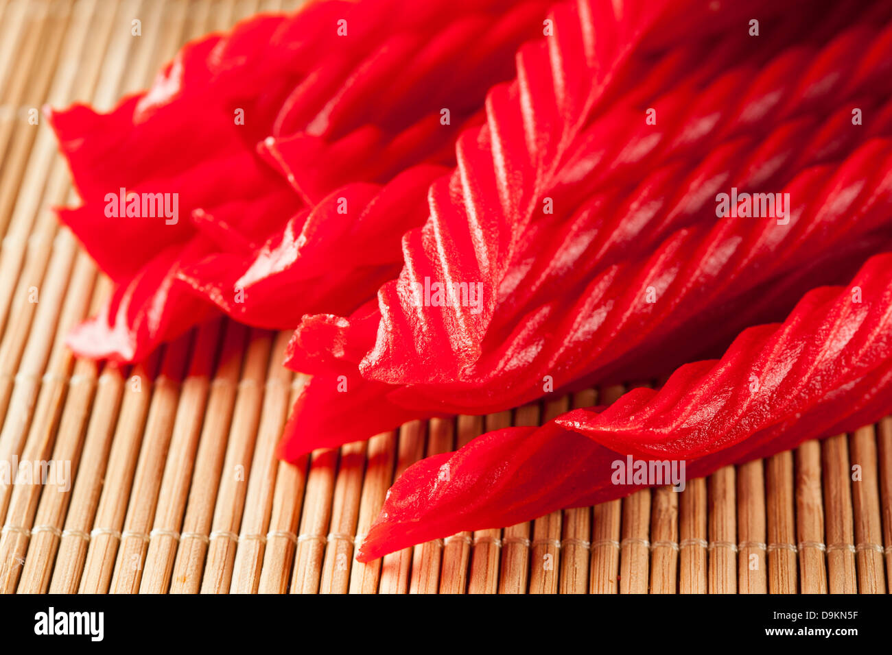 Bright Red Licorice Candy shaped like a twisted rope Stock Photo Alamy