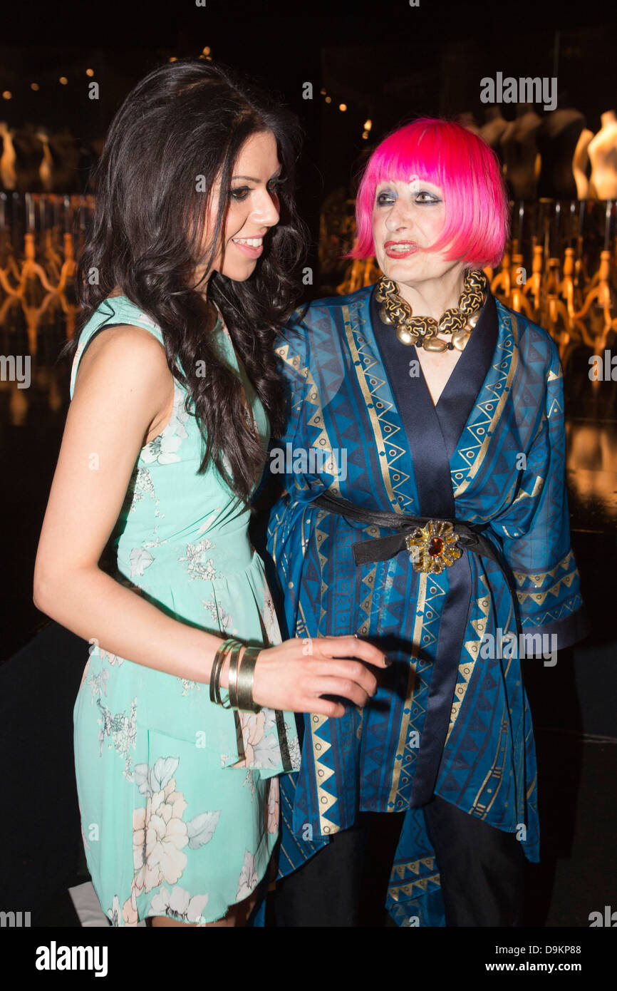 Fashion designer Zandra Rhodes (right) with a guest at Graduate Fashion Week, Gala Show. Stock Photo