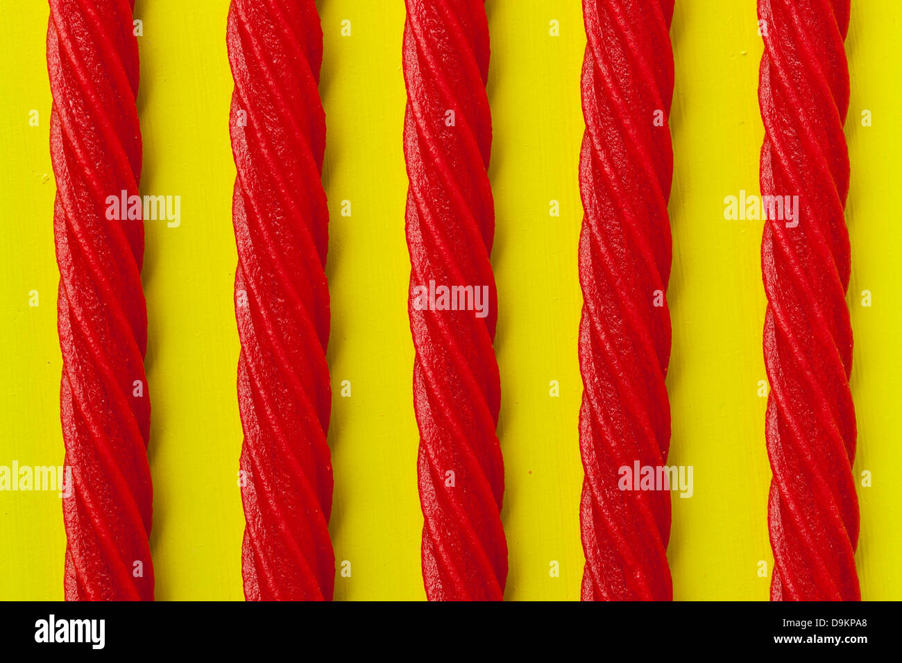 Bright Red Licorice Candy shaped like a twisted rope Stock Photo - Alamy