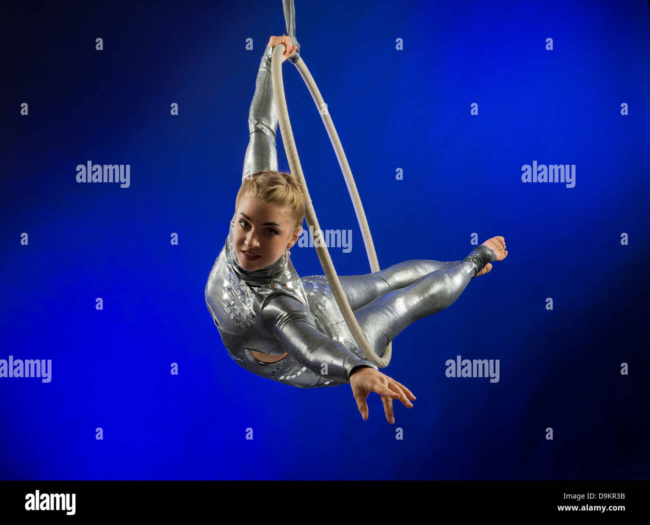 Woman performing acrobatics Stock Photo