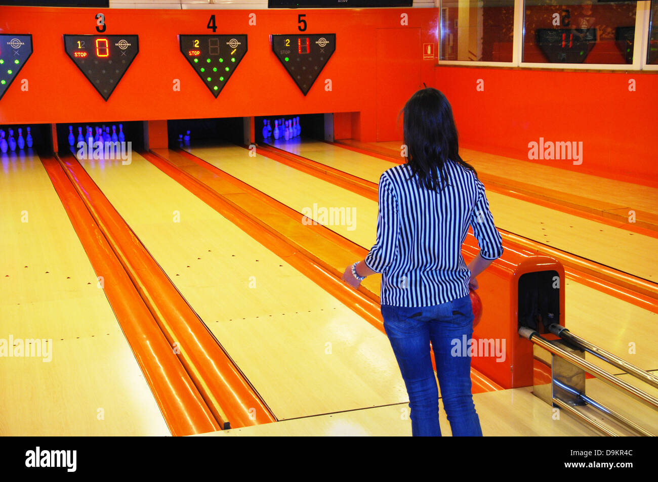 teenage girl bowling Stock Photo