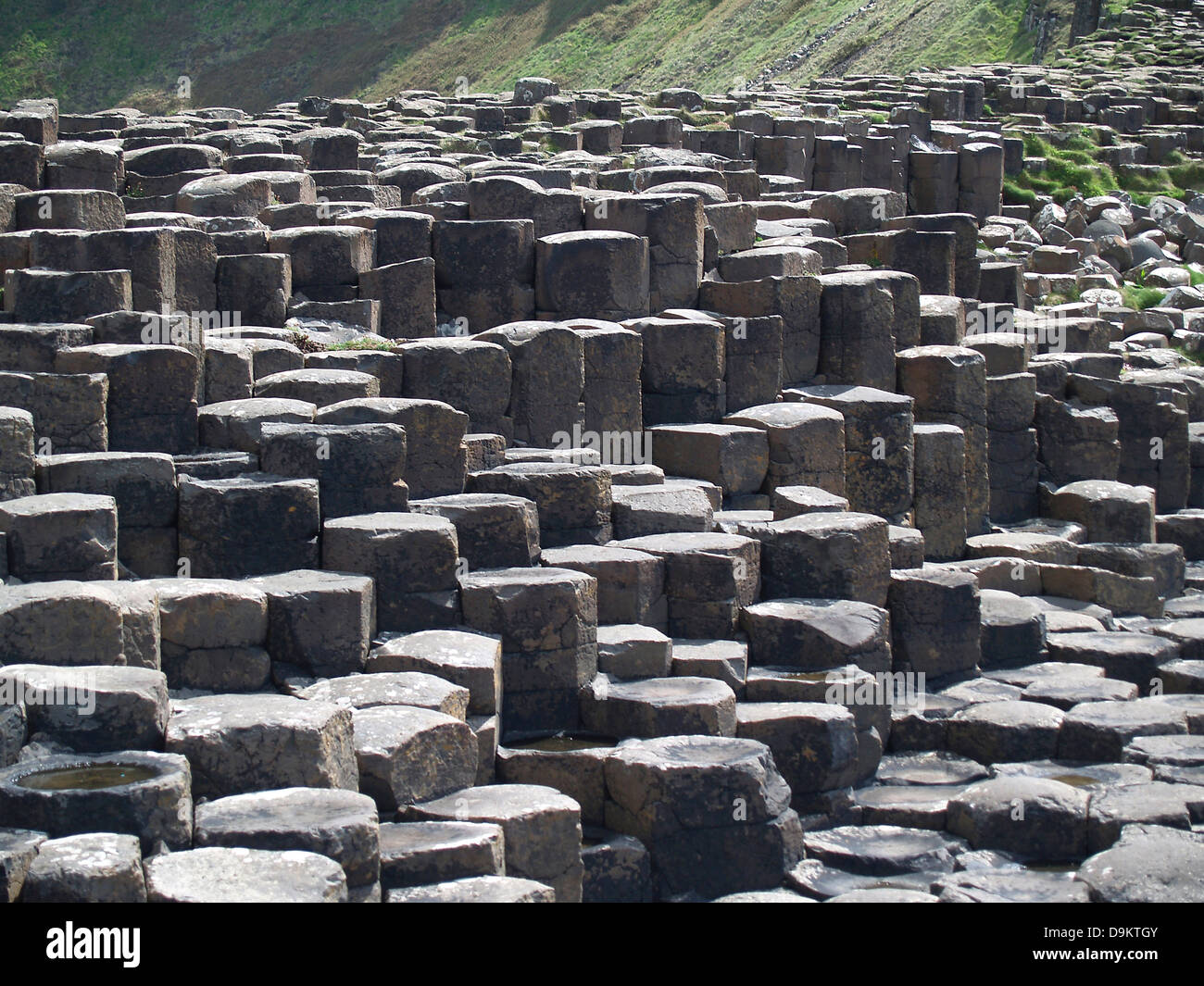 The hexagonal basalt columns of The Giant's Causeway in northern Ireland Stock Photo Alamy