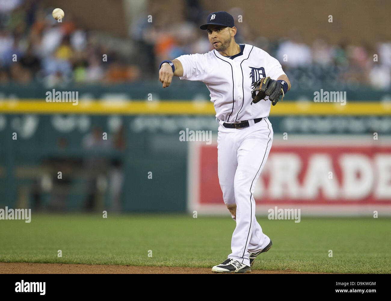 June 17, 2013 - Detroit, Michigan, United States of America - June 17, 2013: Detroit Tigers second baseman Omar Infante (4) throws the ball to first base during MLB game action between the Baltimore Orioles and the Detroit Tigers at Comerica Park in Detroit, Michigan. The Tigers defeated the Orioles 5-1. Stock Photo