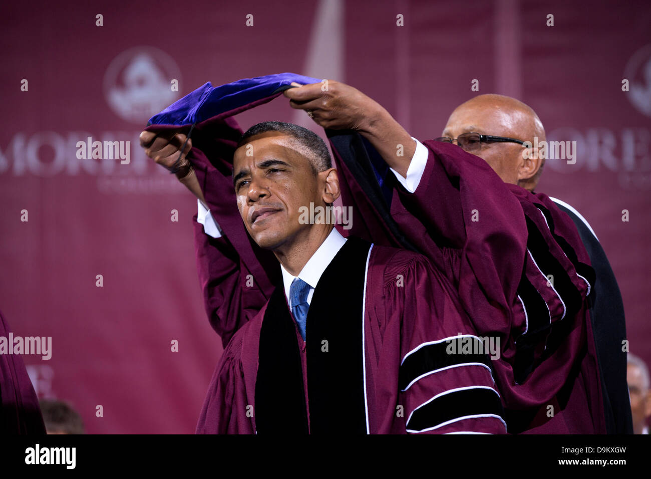 Dr. John Wilson Jr., President of Morehouse College, presents US President Barack Obama with an honorary Doctor of Laws degree during the commencement ceremony at Morehouse College May 19, 2013 in Atlanta, GA. Stock Photo