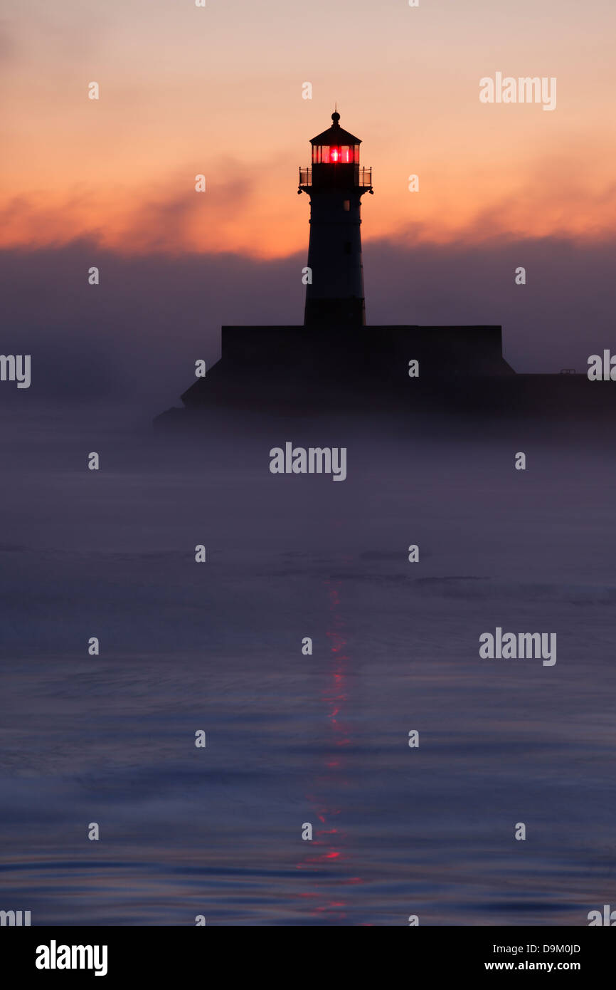 Winter morning view of north pier lighthouse in Duluth, Minnesota. Stock Photo