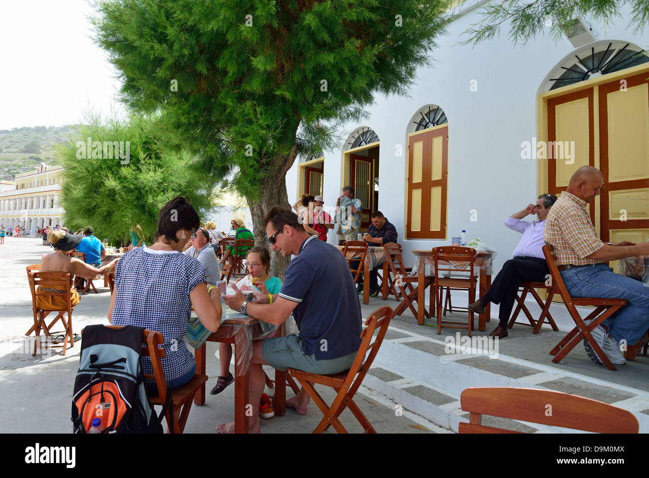 Taverna outside The Monastery of St Michael at Panormitis, Symi (Simi), Rhodes (Rodos) Region, Dodecanese, South Aegean, Greece Stock Photo