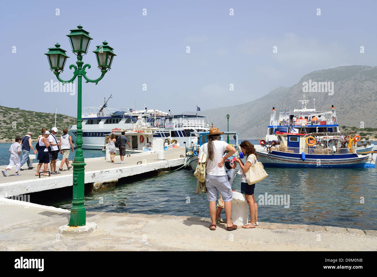 Fishing port at The Monastery of St Michael at Panormitis, Symi (Simi), Rhodes (Rodos) Region, Dodecanese, South Aegean, Greece Stock Photo