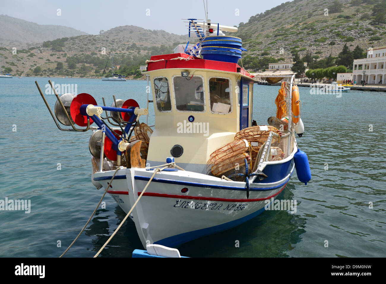 Fishing port at The Monastery of St Michael at Panormitis, Symi (Simi), Rhodes (Rodos) Region, Dodecanese, South Aegean, Greece Stock Photo